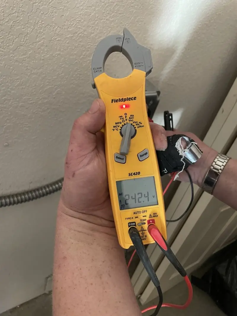 Voltage testing with clamp meter during Hot Tub / Pool Electrical Wiring in Pelham